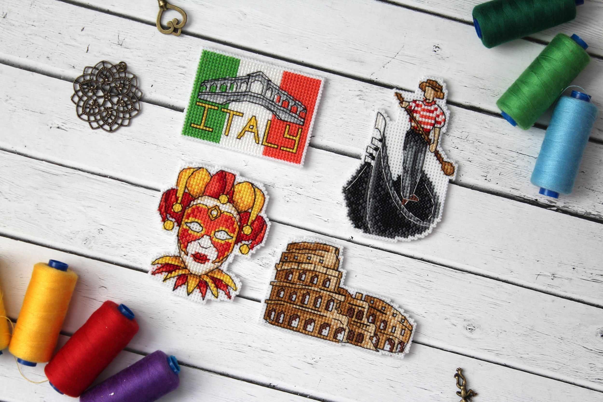 Italy Magnets P-309 / SR-309 Cross Stitch Kit featuring colorful threads and plastic canvas for crafting.